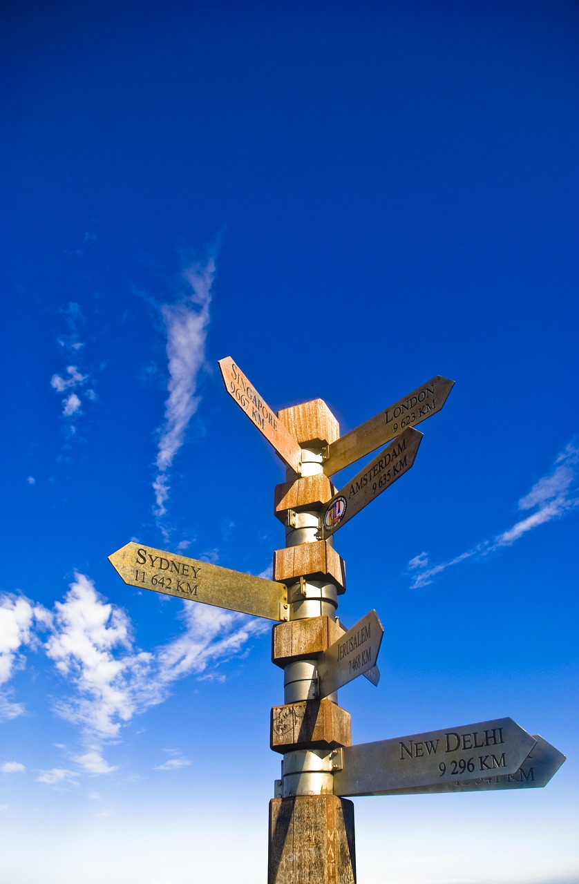 signage, direction, sky, arrow, sign, symbol, nature, information, guide, street, pointer, directional, signpost, blue sky, roadsign, blue, guidepost, board, travel, blue arrow, blue information, blue board